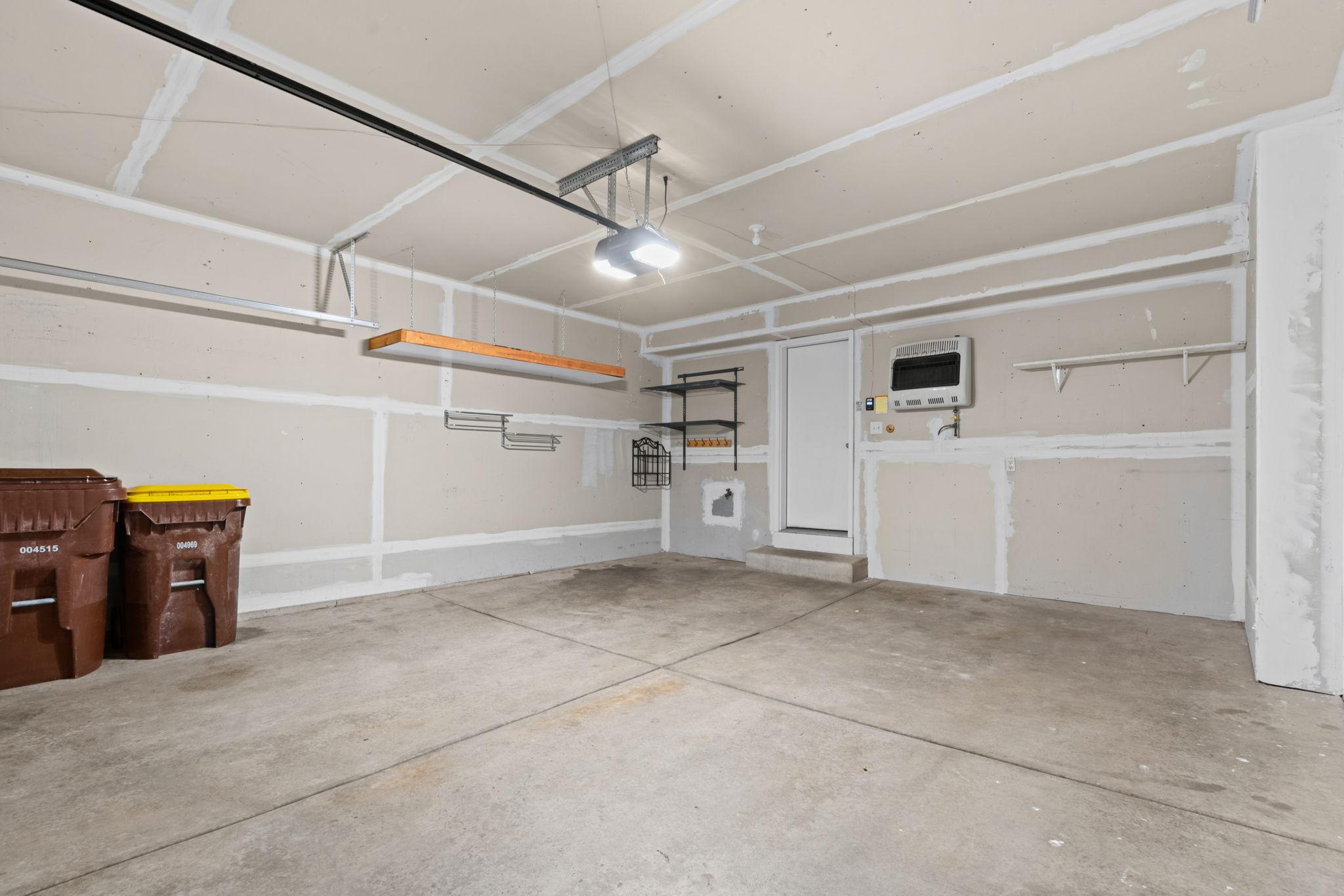 Insulated, drywalled, and heated garage. Lots of storage shelves in the garage.