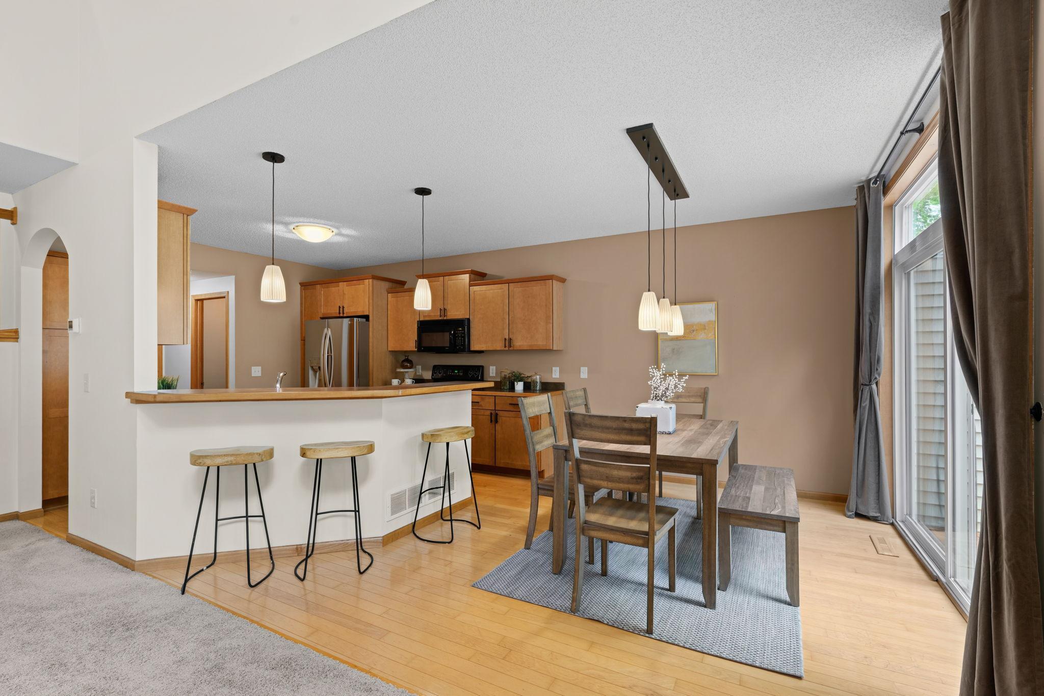 kitchen, dining, patio door to deck on right