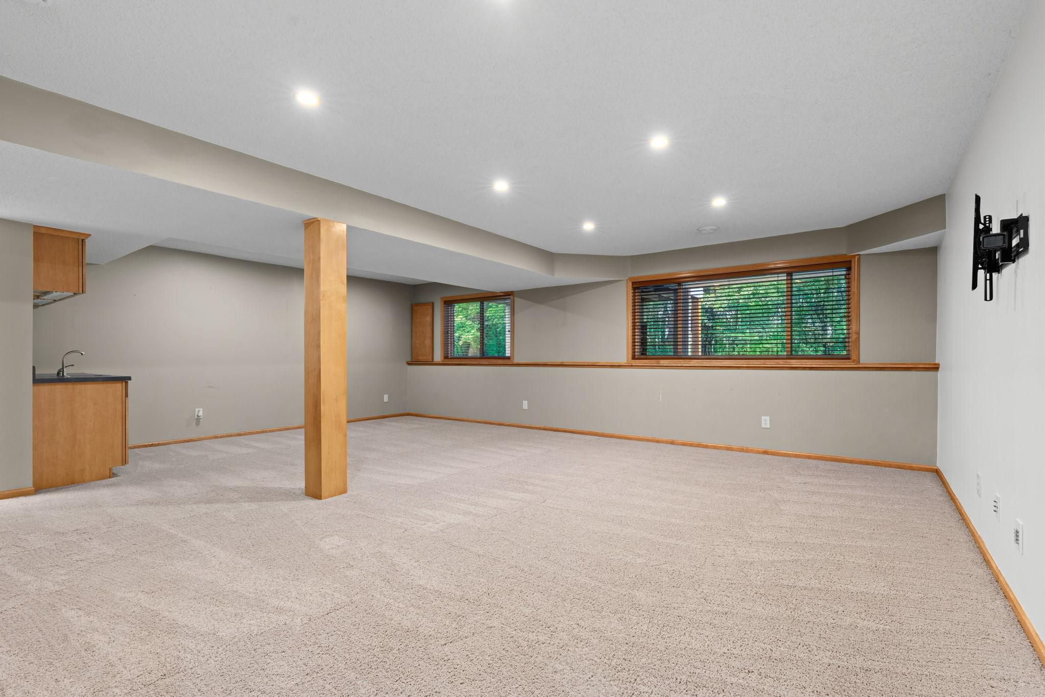 large basement with lookout windows