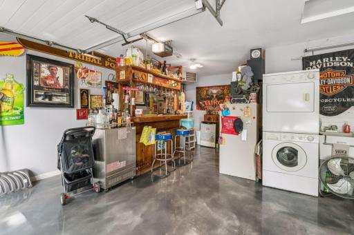 Heated & Insulated 2 car garage space offers private washer & dryer