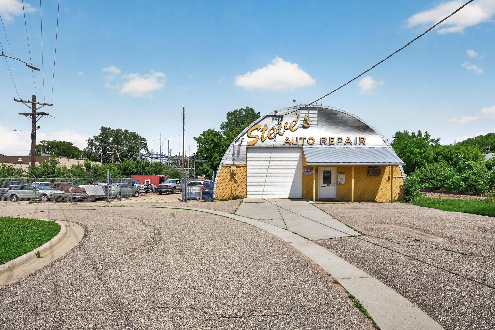 Shop & fenced parking lot