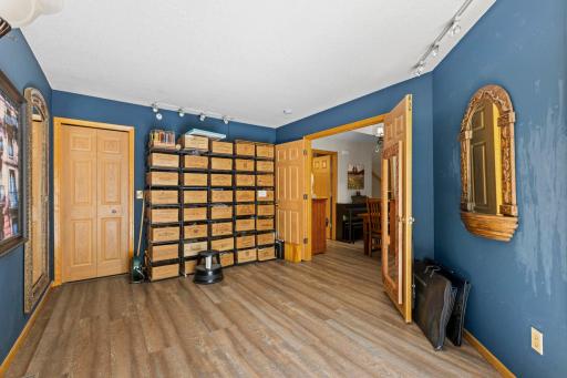 Main floor bedroom has beautiful french doors