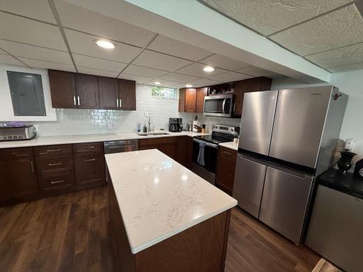 Stainless Steel Appliances, all new main level flooring.