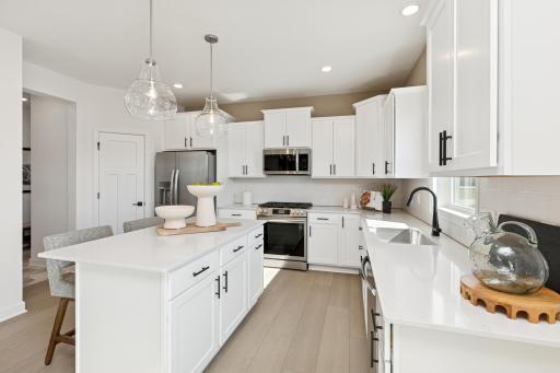 (Photo of a decorated model, actual homes finishes will vary)