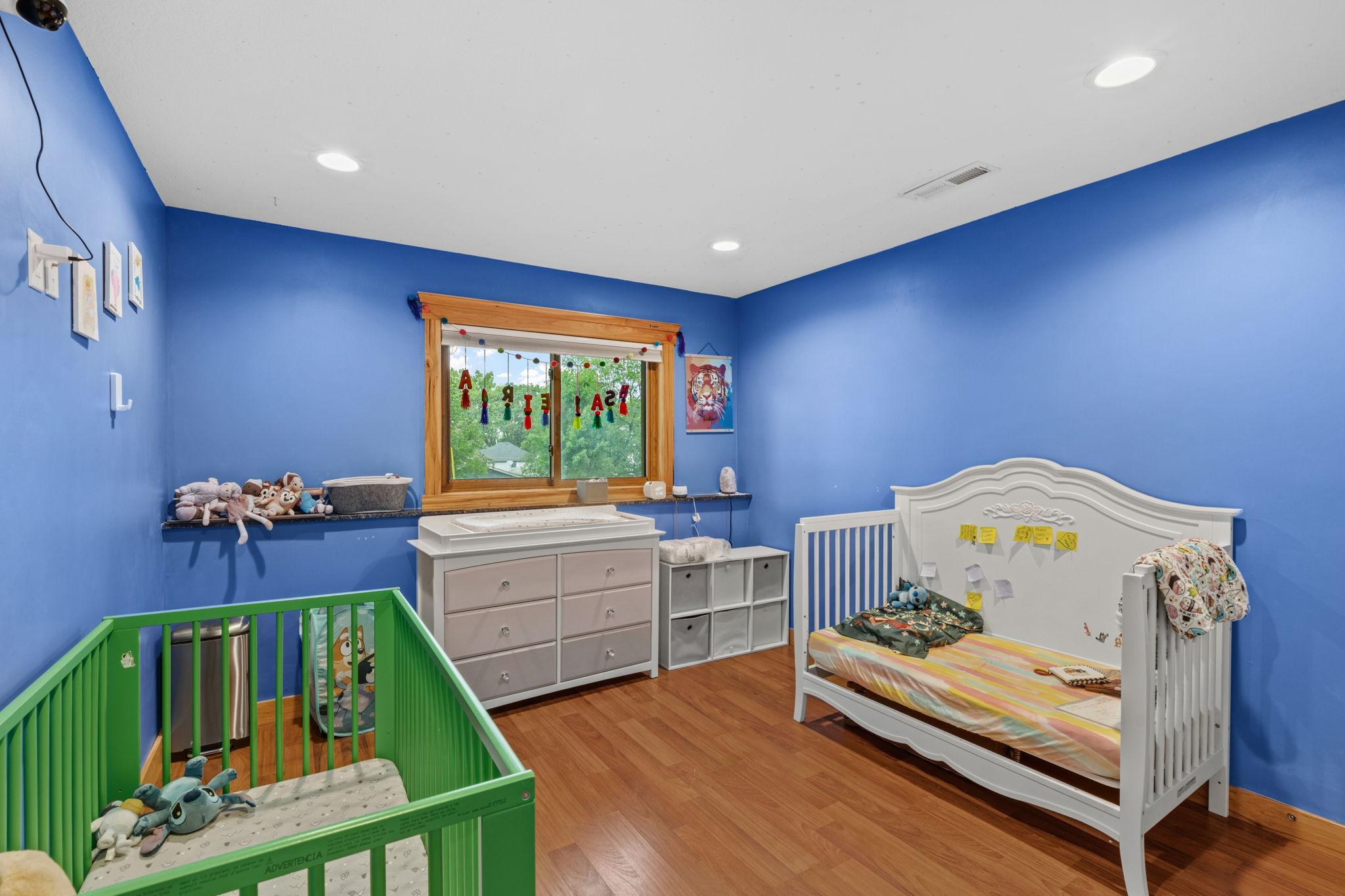 One of 2 lower level bedrooms. Fresh paint in 2025.