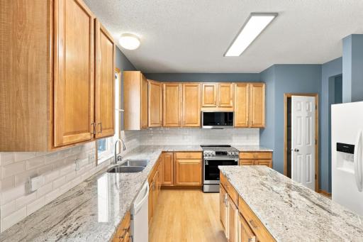 Nicely updated kitchen with granite countertops