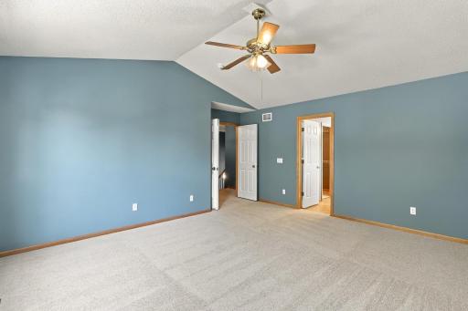 Primary bedroom with en suite, bathroom and large walk-in closet