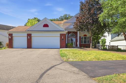 Great curb appeal with three car garage and newly seeded grass