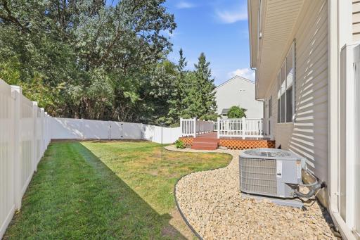 Fully fenced yard with maintenance free deck