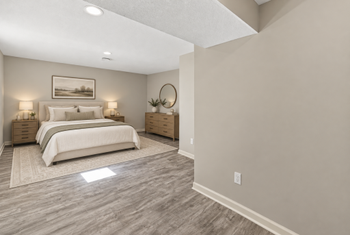Virtually staged oversized 5th bedroom in lower level