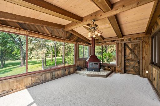 Three season porch with wood burning stove