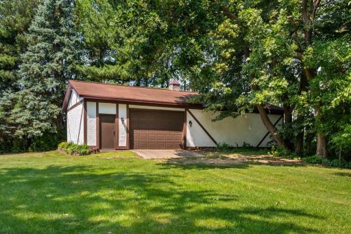 Large detached garage 77ft x 32ft with a 8ft x 12ft garage door