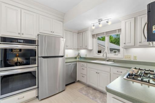 You'll love the designer tiled flooring. Double oven too makes dinner prep a snap