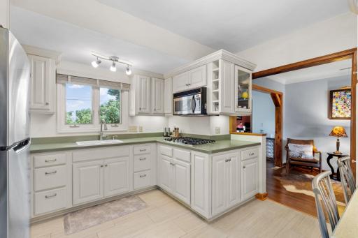 Another view of kitchen open to living spaces