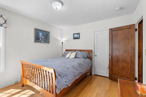 Main floor bedroom with rare bamboo flooring