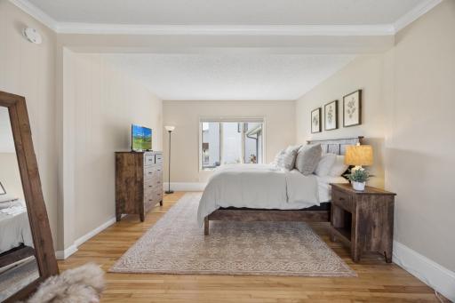 Main floor living area has been used as a primary bedroom