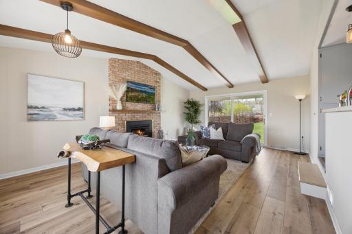 Beautiful wood beam and walks right out to your back patio