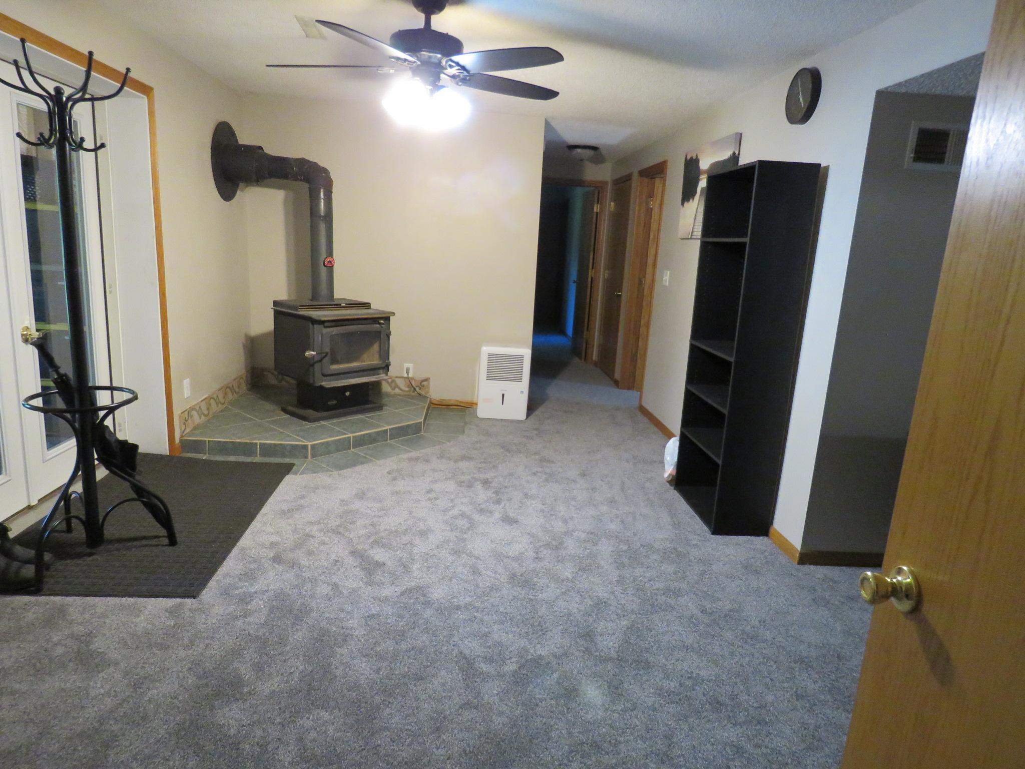 Free standing wood burning fireplace in lower level!