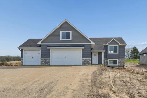 Photos are of a previously completed home with similar design and features. Actual selections, finishes, and materials may vary based on buyer choices and availability.