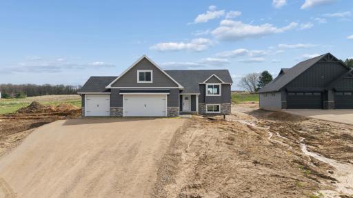 Photos are of a previously completed home with similar design and features. Actual selections, finishes, and materials may vary based on buyer choices and availability.