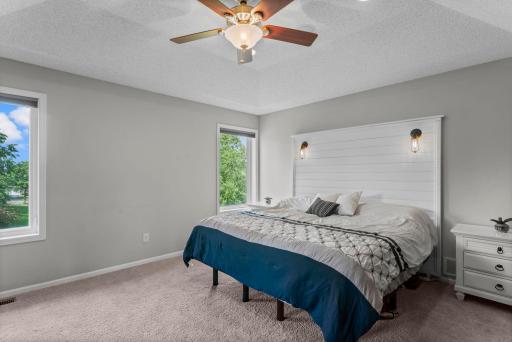 Upstairs, four generously sized bedrooms provide exceptional space.
