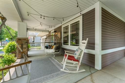 The welcoming wraparound front porch is the perfect spot to enjoy your morning coffee or unwind at the end of the day.