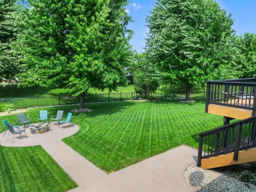 Spacious patio (2017) with a designated firepit area!