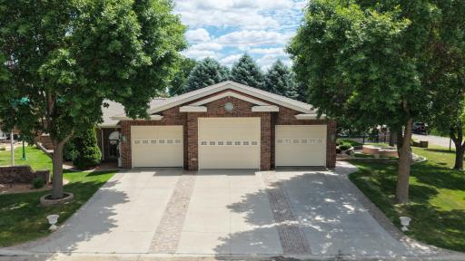Multiple garage bays with exceptional space for vehicles, equipment, storage, or workshop use