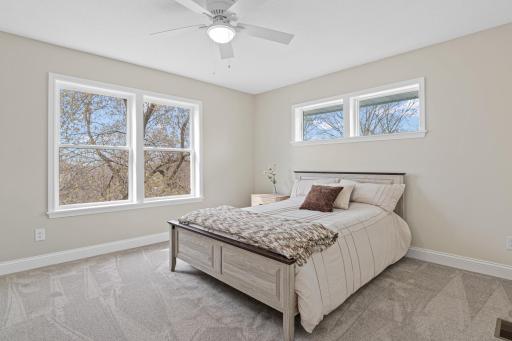 Owners Suite with view of Lake through trees