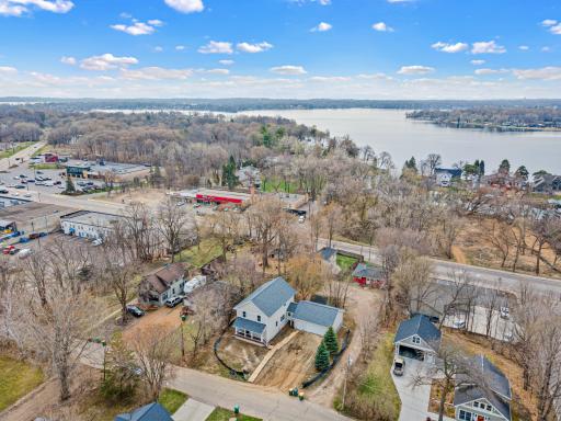 Aerial of lake Minnetonka to rearand short walk to downtown Navarre