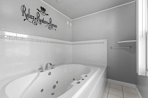 Main Floor Bathroom w/ Shower & XL Jetted Tub