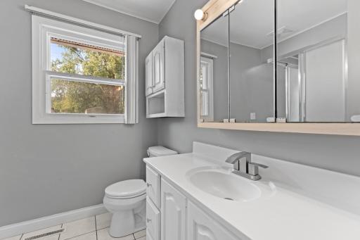 Main Floor Bathroom w/ Shower & XL Jetted Tub