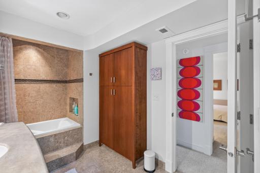 Linen closet in the hallway PLUS additional cabinets in bath