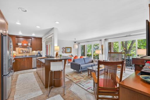 The main living area features a dramatic wall of floor to ceiling windows!