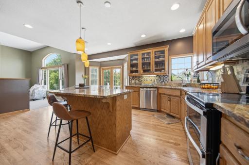 Stainless steel, Hardwood floors, & Granite.
