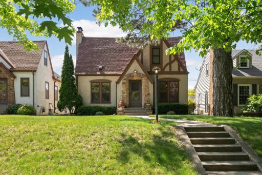 Classic tudor home with new roof in 2023.