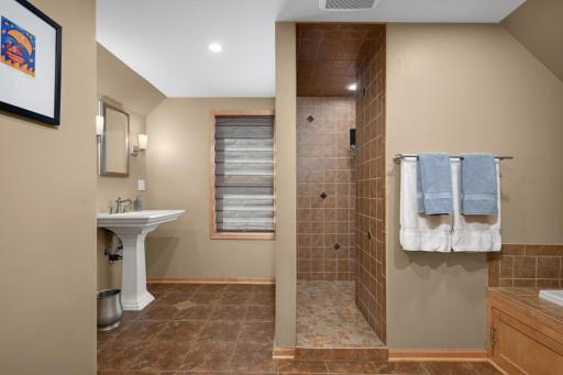 Large Primary Bathroom with separate tiled shower and jetted tub