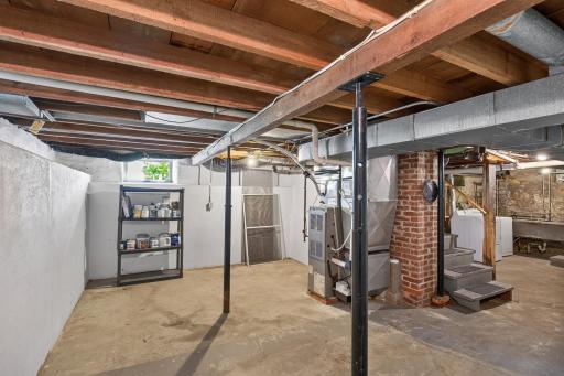 The basement is clean and cleared out. Lots of storage or workout space.