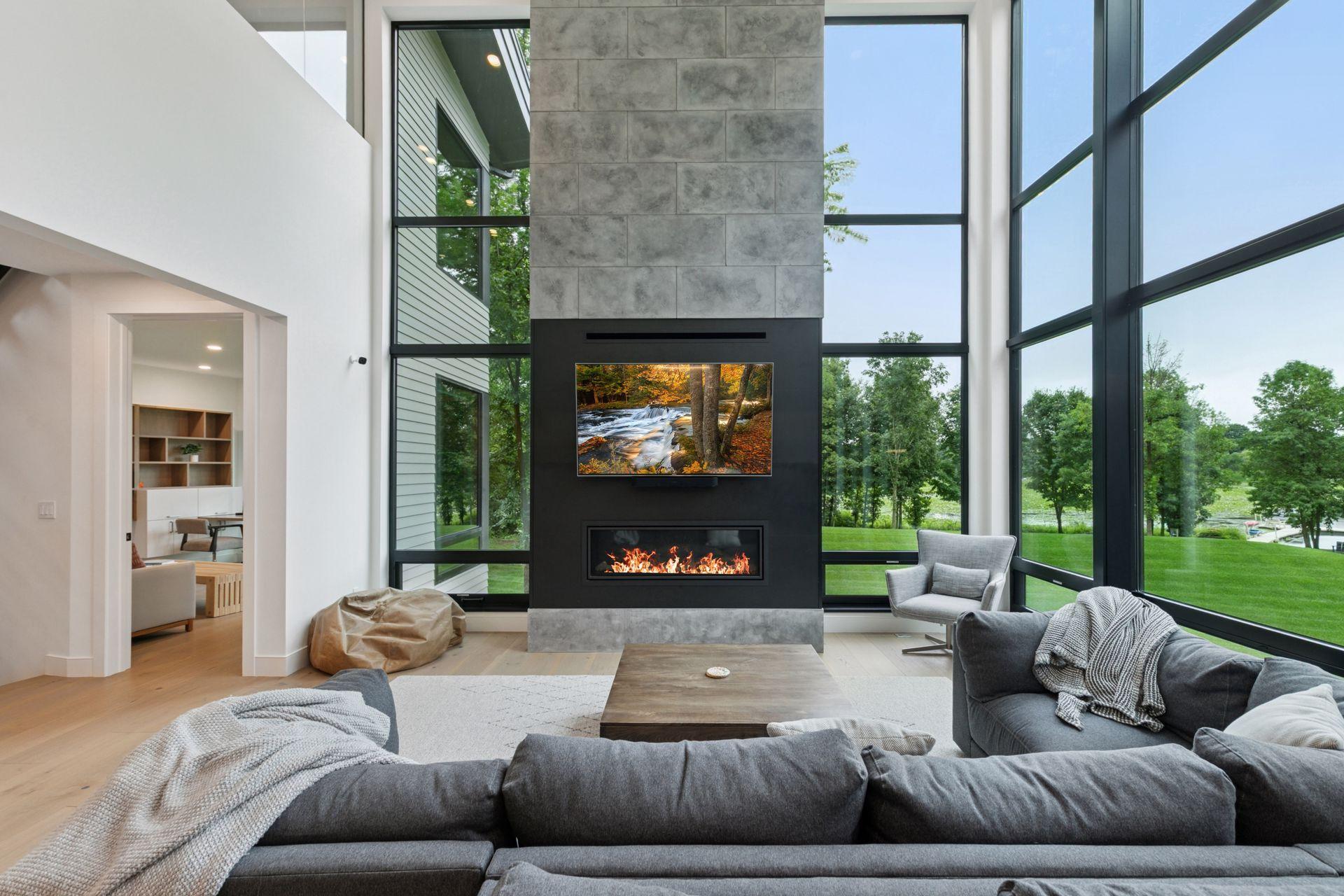 Wall of glass windows offer spectacular, panoramic lake views and the calming presence of nature.
