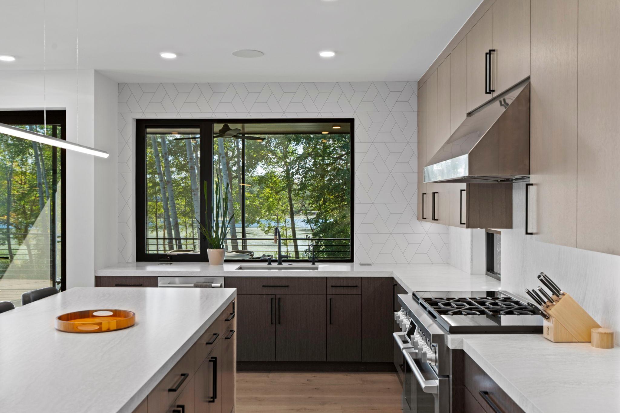 Kitchen window brings an abundance of natural light and nature views inside.