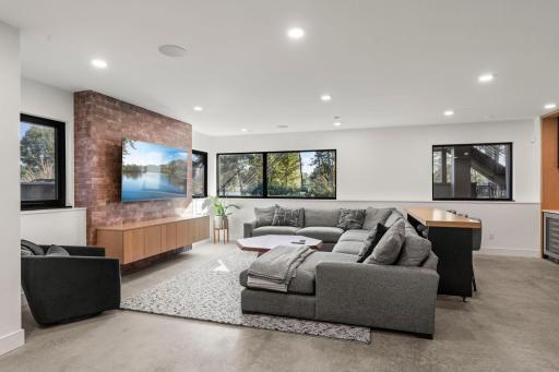 Family room with a view. Large lookout windows accent the