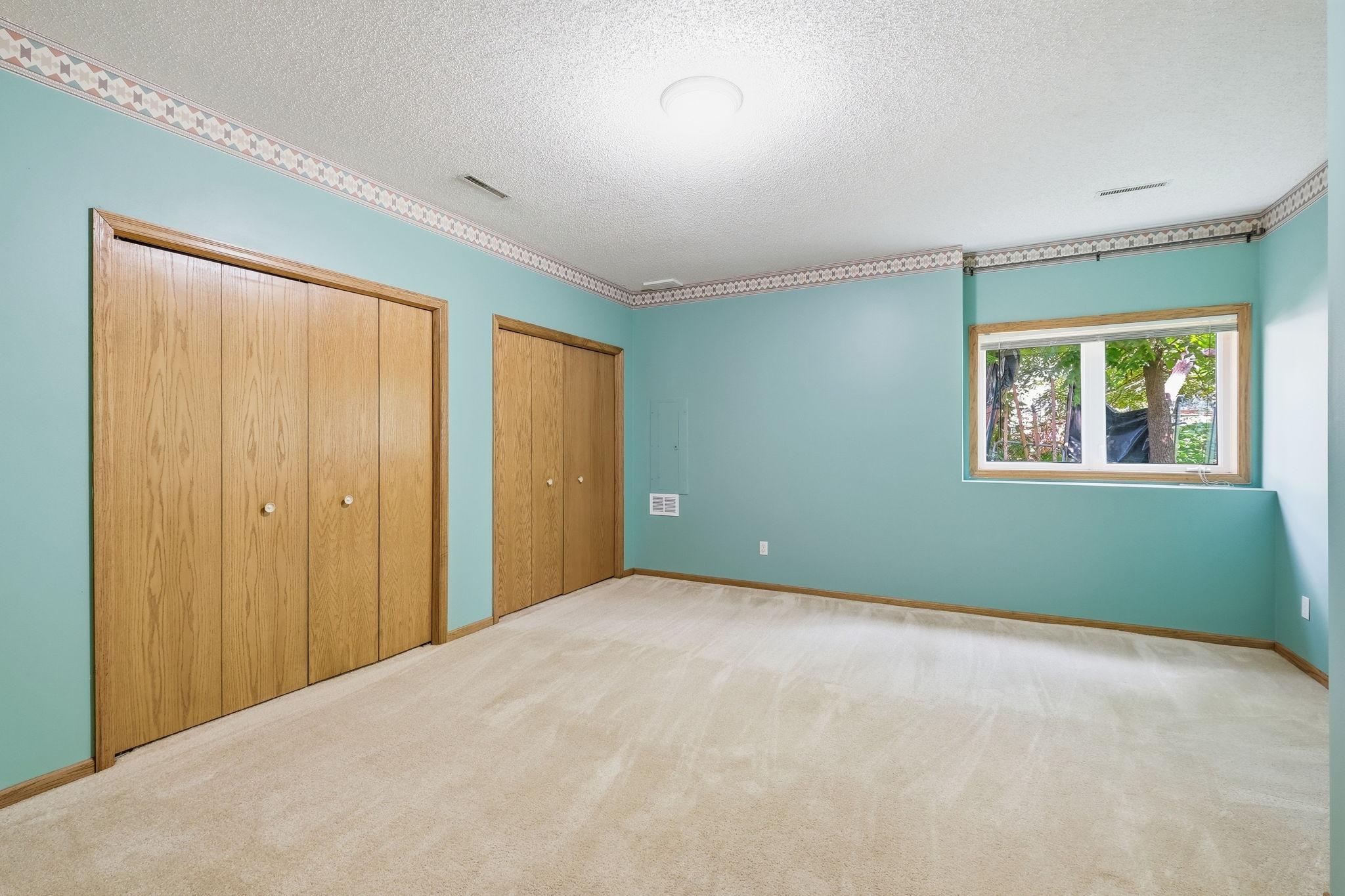One of two bedrooms on the lower level.