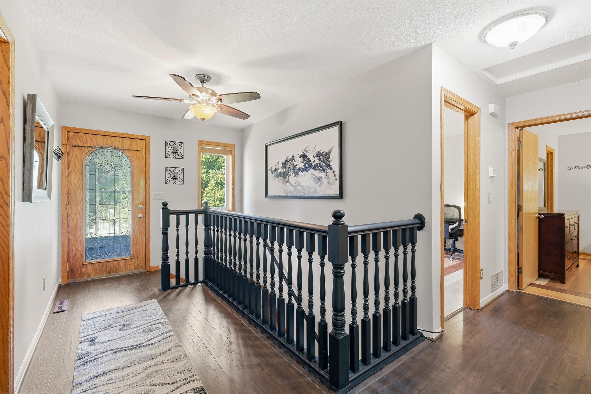 Bright and welcoming front entry creates an inviting first impression.