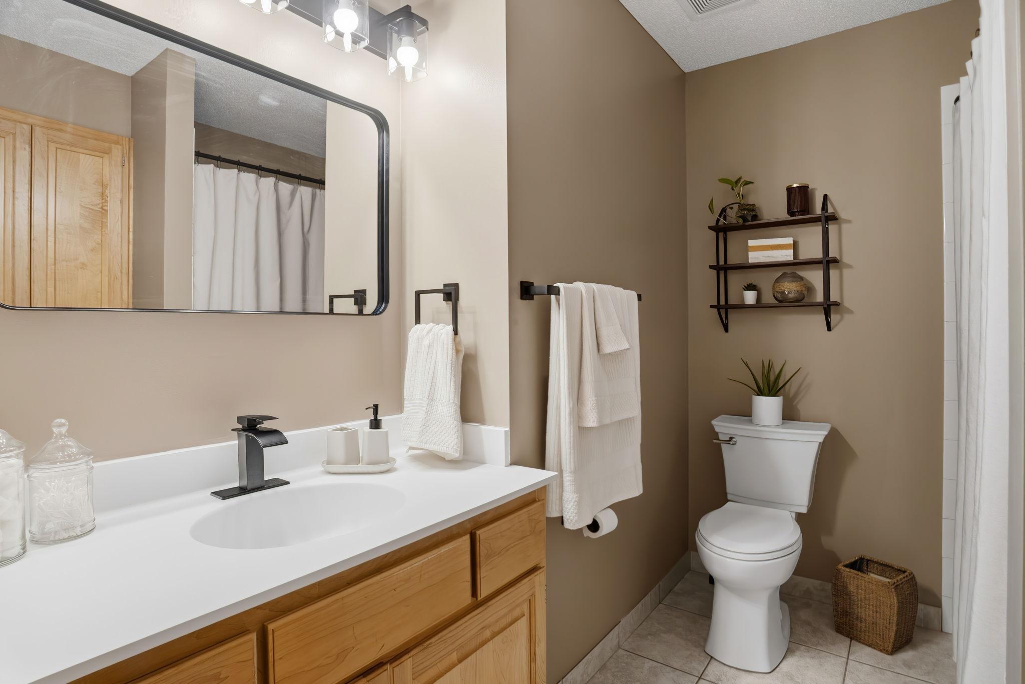 Shared full, upper level bathroom also just refreshed.