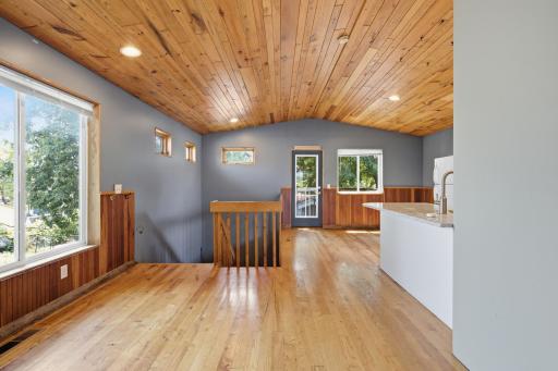 Upper living area with door to small deck