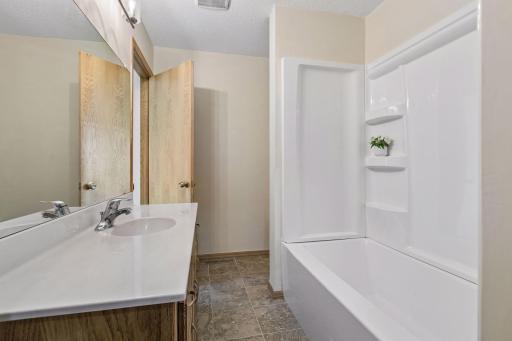 Brand new tub and shower in the full bath.