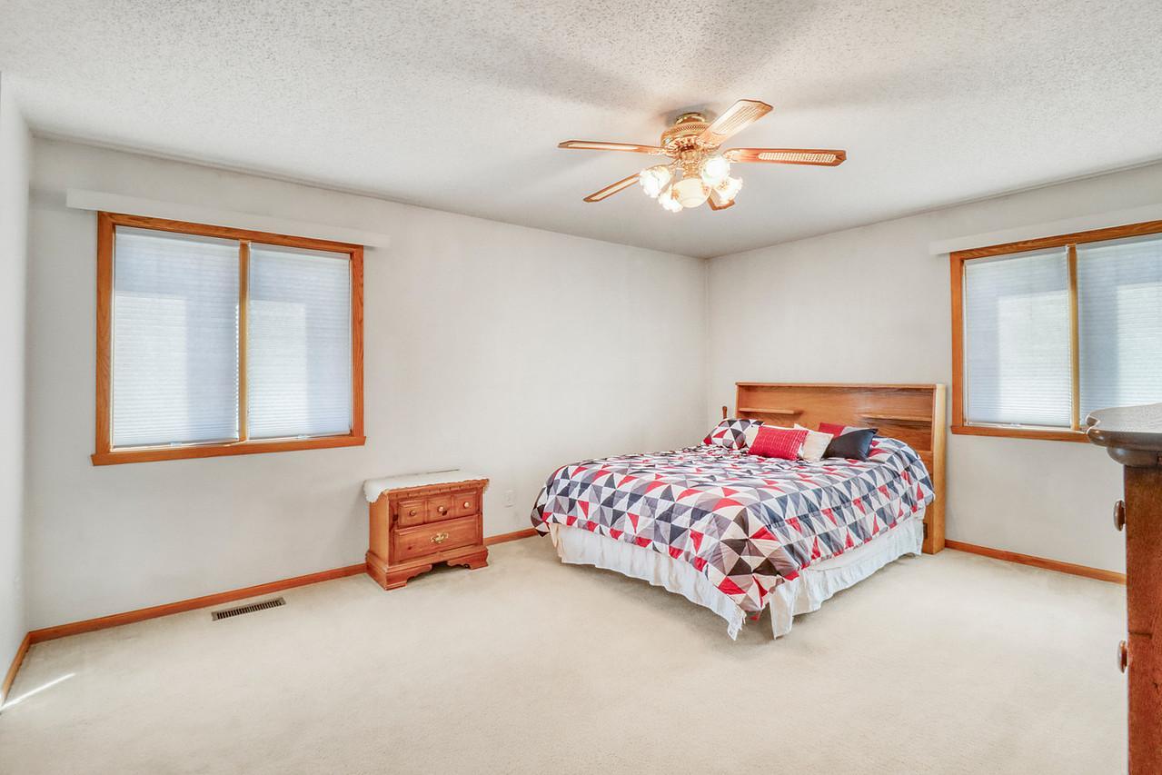 Primary Bedroom w/ ceiling fan