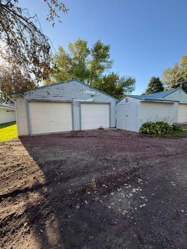 Front Side of Garage + Garden Shed