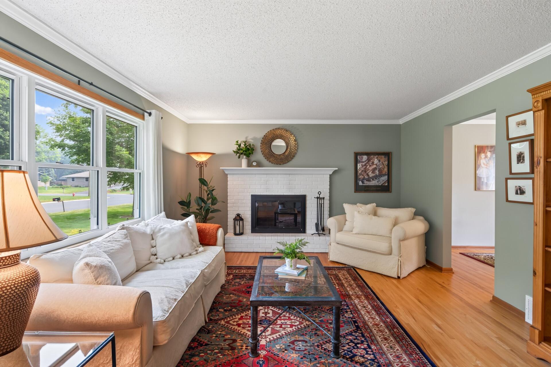 Living room with wood burning fireplace