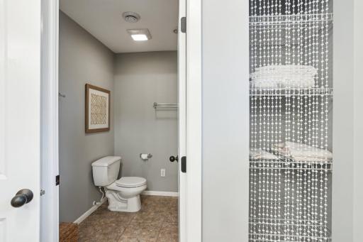 Shared bathroom was designed for busy mornings in mind, with a separate door for the shower and vanity.